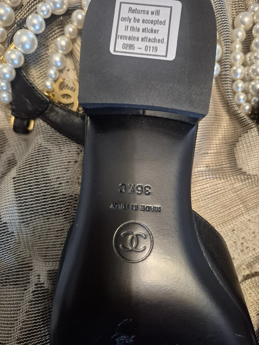 CHANEL black leather pointed-toe flats with pearls